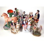 A GROUP OF FOURTEEN STAFFORDSHIRE FIGURES (14)