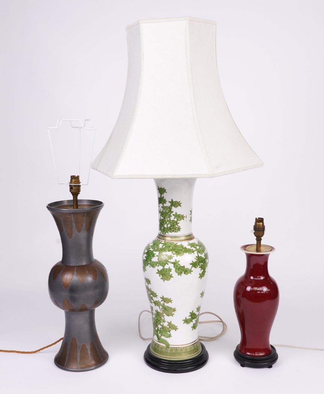 A SANG-DE-BOEUF TABLE LAMP AND TWO OTHER LAMPS (3)