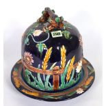 A MAJOLICA STYLE BLUE GROUND CHEESE DOME AND STAND, (2)