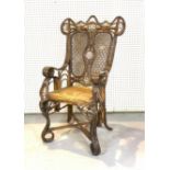 POSSIBLY HEYWOOD BROTHERS; AN EARLY 20TH CENTURY BAMBOO OPEN ARMCHAIR