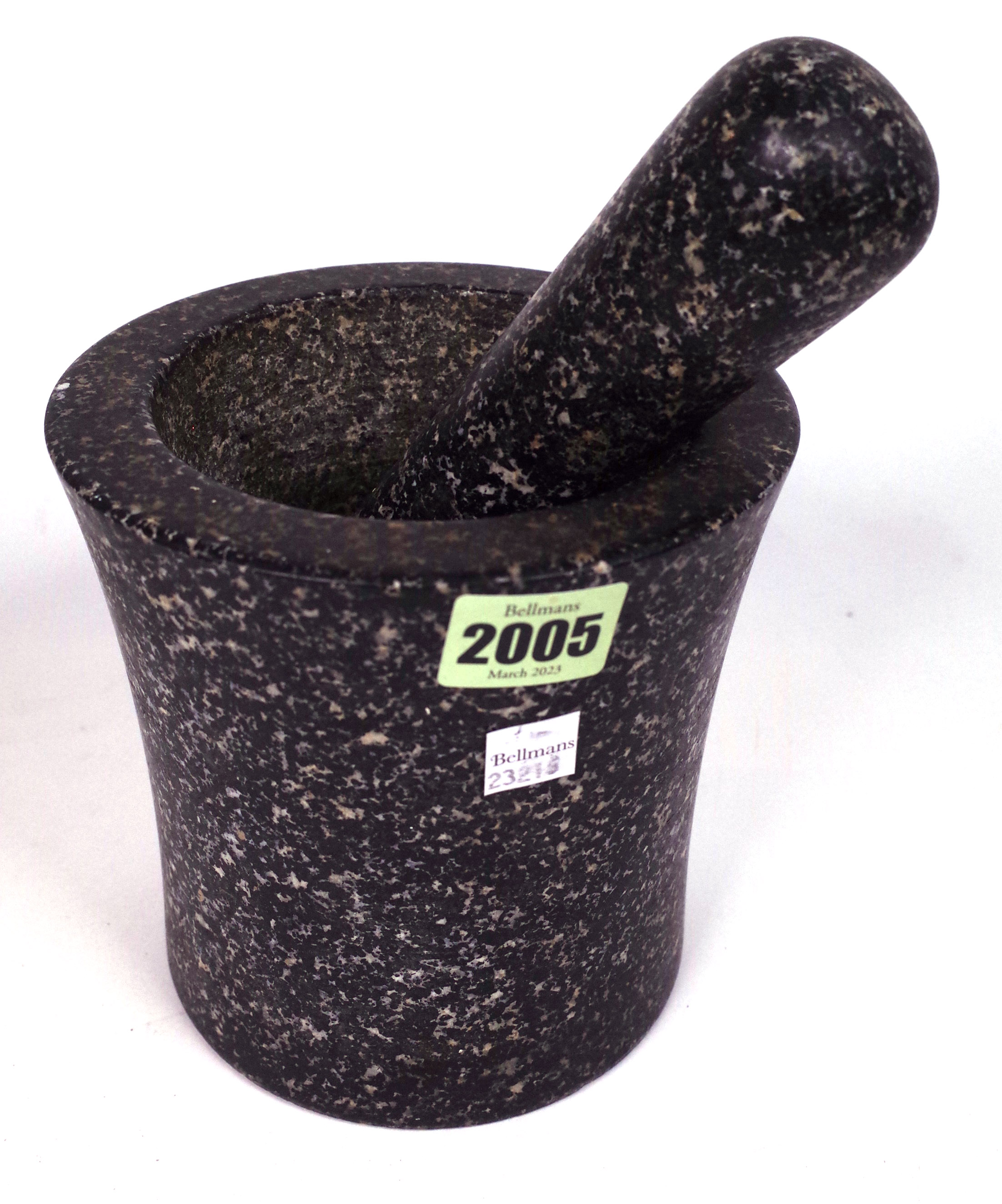 WITHDRAWN A BLACK MARBLE PESTLE AND MORTAR