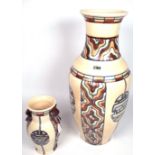 A TALL ROYAL CAULDON OVOID VASE BY EDITH GATER AND A SMALLER SIMILAR TWO-HANDLED VASE (2)
