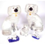 A GROUP OF FIVE STAFFORDHSIRE PORCELAIN DOGS (5)