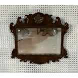 A GEORGE III STYLE MAHOGANY FRET FRAMED MIRROR