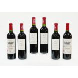 FOUR BOTTLES OF MADAME CHATEAU DE PITRAY 2009 AND TWO BOTTLES OF CHATEAU GRAND PUY LACOSTLES...