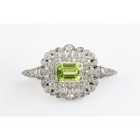 A PERIDOT AND DIAMOND BROOCH CIRCA 1915