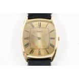 A PIAGET GOLD CURVED RECTANGULAR CASED GENTLEMAN'S WRISTWATCH