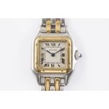 A CARTIER TANK STEEL AND GOLD LADY'S QUARTZ BRACELET WATCH