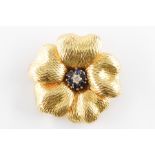 A TIFFANY AND CO DIAMOND AND SAPPHIRE FLOWER BROOCH