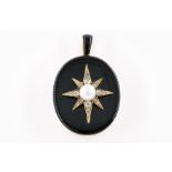 A VICTORIAN DIAMOND AND BLACK ONYX OVAL PENDANT LOCKET