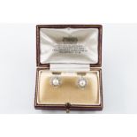 A PAIR OF DIAMOND AND CULTURED PEARL EARRINGS