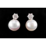 A PAIR OF DIAMOND AND SOUTH SEA PEARL EARRINGS