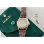 A ROLEX OYSTER PERPETUAL 9CT GOLD CASED GENTLEMAN'S WRISTWATCH