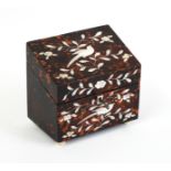 A 19TH CENTURY MOTHER OF PEARL INLAID TORTOISESHELL SLOPE FRONT TEA CADDY