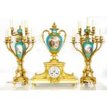 A GOOD FRENCH ORMOLU AND SEVRES STYLE CLOCK GARNITURE