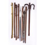 A GROUP OF ASSORTED SCABBARDS AND A BLADE (9)