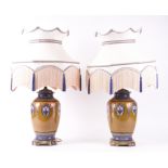 A PAIR OF CERAMIC BEIGE AND BLUE BALUSTER VASE TABLE LAMPS (2)