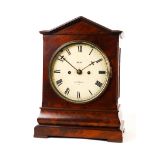 AN EARLY VICTORIAN MAHOGANY BRACKET CLOCK