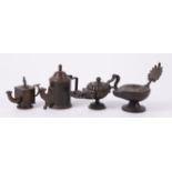 A GROUP OF FOUR ORNAMENTAL BRONZE TABLE OIL LAMPS (4)