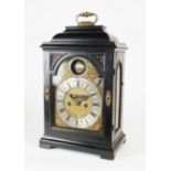 A RARE AND UNUSUAL GEORGE I EBONY STRIKING BRACKET CLOCK WITH REVOLVING SPHERICAL MOON PHASE...