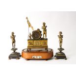 OF NAPOLEON BONAPARTE INTEREST: A FRENCH GILT-BRONZE MOUNTED TIMEPIECE AND TWO GILT-BRONZE...