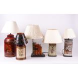 A FAUX BOOK TABLE LAMP, TOGETHER WITH TWO TOLE TEA CANISTER LAMPS (5)