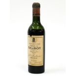 A HALF BOTTLE OF CHATEAU TALBOT MEDOC 1934