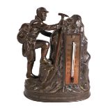 A BRONZE FIGURAL TABLE THERMOMETER MODELLED AS A MOUNT EVEREST CLIMBER