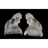 A PAIR OF ART DECO FROSTED GLASS RAM BOOKENDS (2)
