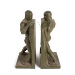 A PAIR OF AMERICAN ART DECO FRANKART METAL BOOKENDS MODELLED AS MALE WRESTLERS
