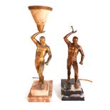 A NEAR PAIR OF ART DECO GILT-METAL FIGURAL TABLE LAMPS MODELLED AS MALE ATHLETES