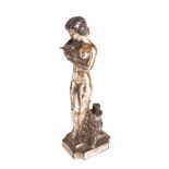 AN ART DECO SILVERED METAL FIGURAL TABLE LIGHTER