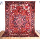 A HERIZ CARPET, PERSIAN