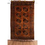 A GOLDEN AFGHAN RUG