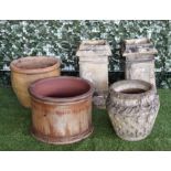 A PAIR OF SQUARE TERRACOTTA CHIMNEY POTS (5)