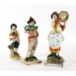 THREE STAFFORDSHIRE PEARLWARE FIGURES OF MUSICIANS (3)