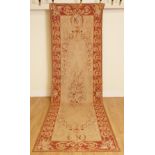 AN AUBUSSON STYLE WOVEN RUNNER