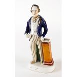 A STAFFORDSHIRE POTTERY FIGURE OF SIR ROBERT PEEL