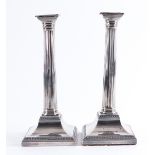 A PAIR OF EARLY GEORGE III SILVER TABLE CANDLESTICKS