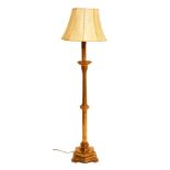 A GOTHIC REVIVAL GILTWOOD STANDARD LAMP