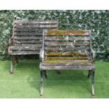 A 19TH CENTURY GREEN PAINTED CAST IRON SMALL GARDEN BENCH (2)