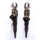 A PAIR OF LOUIS XVI STYLE GILT-METAL GOAT'S HEAD WALL APPLIQUES (2)