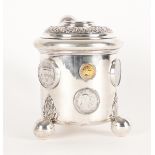 A SWEDISH TANKARD MOUNTED WITH COINS