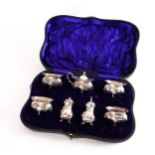 A SILVER SEVEN PIECE CONDIMENT SET