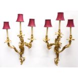 A PAIR OF FRENCH LOUIS XV STYLE ORMOLU THREE BRANCH WALL LIGHTS (2)