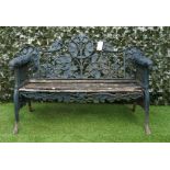 AFTER COALBROOKDALE: A GREEN PAINTED CAST IRON OAK AND IVY PATTERN BENCH