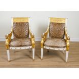 A PAIR OF EMPIRE REVIVAL PARCEL-GILT CREAM PAINTED OPEN ARMCHAIRS (2)