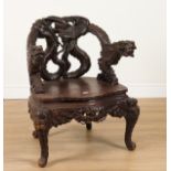 A 19H CENTURY CHINESE EXPORT CARVED HARDWOOD CHAIR WITH DRAGON AND PEARL ARM FINNIALS