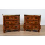 PROVASI: A PAIR OF KINGWOOD AND WALNUT PARCEL GILT BOWFRONT THREE DRAWER BEDSIDE TABLES (2)