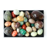 A GROUP OF TWENTY-EIGHT SPECIMEN MINERAL EGGS AND BALLS (28)